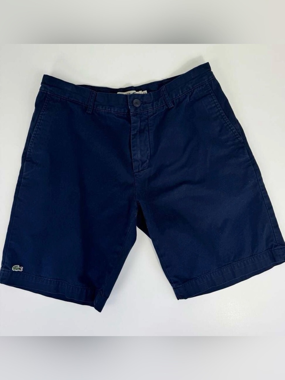 Lacoste classic fit chino shorts in navy blue.
Size 34